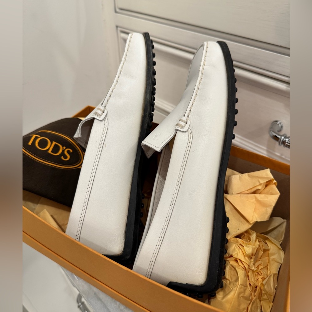 Tod's White and Black Flats with Signature Pebbled Sole